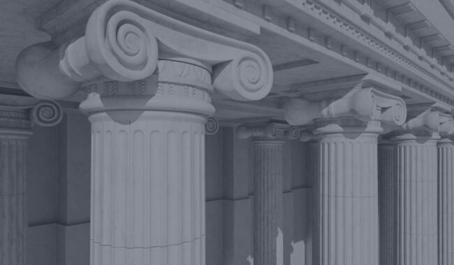 A close up of some pillars in a building